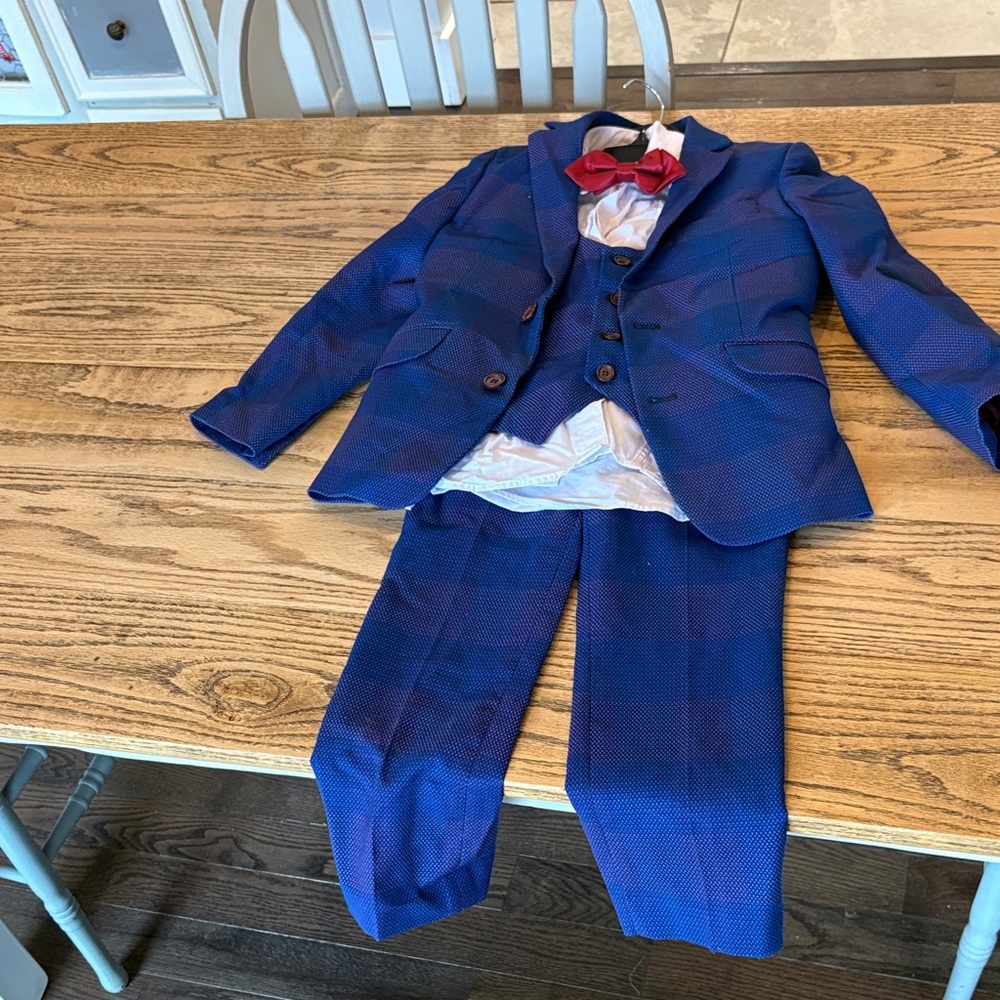 Blue Men's Suit with Red Bow Tie